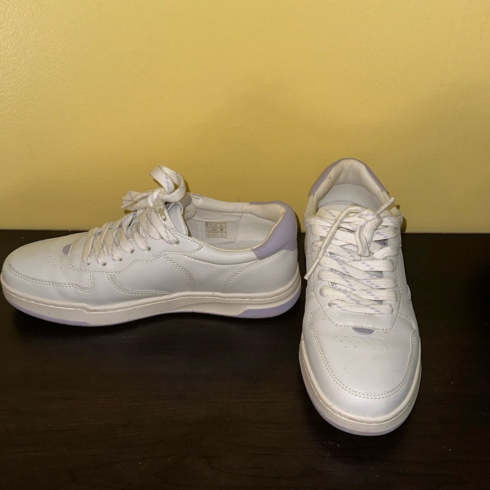 White and lavender tennis shoes